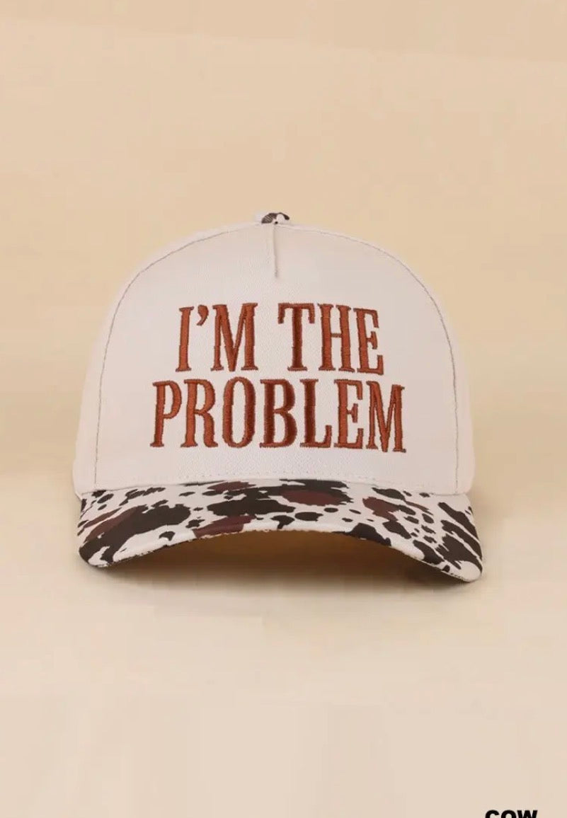 Z1B-UA777COW I’m the problem embroidered Tab Embroidered Trucker Cap