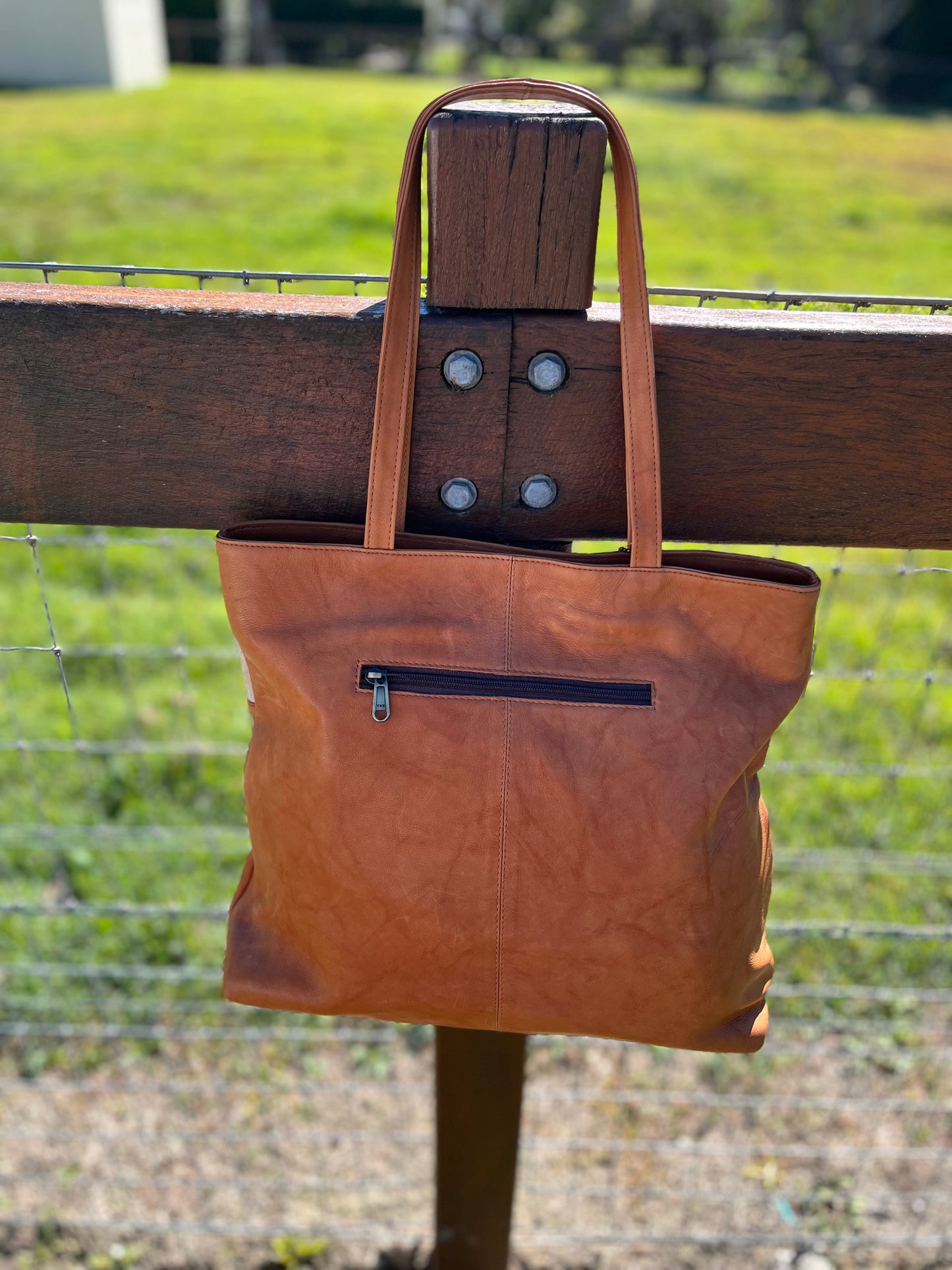 B71028BR Jersey Hide Handbag Tan