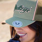 B6W2948CAP Bullzye Women's Rhea HP Trucker Cap