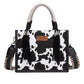 X6W4901BAG Wrangler Cow Print Tassel Crossbody Bag